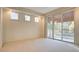 Bright bedroom with sliding door to balcony at 8236 Horseshoe Bend Ln, Las Vegas, NV 89113