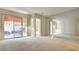 Spacious bedroom with mirrored wall and access to the backyard at 8236 Horseshoe Bend Ln, Las Vegas, NV 89113