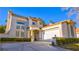 Two-story house with a white garage door and manicured landscaping at 8236 Horseshoe Bend Ln, Las Vegas, NV 89113