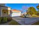 Attached two-car garage with driveway and landscaping at 8236 Horseshoe Bend Ln, Las Vegas, NV 89113