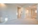 Spacious hallway with carpeted floor and access to other rooms at 8236 Horseshoe Bend Ln, Las Vegas, NV 89113