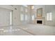 High-ceilinged living room with fireplace and tiled floor at 8236 Horseshoe Bend Ln, Las Vegas, NV 89113