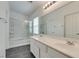 Clean bathroom with double vanity and shower/tub combo at 8808 Tom Noon Ave # 101, Las Vegas, NV 89178