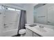 Clean bathroom with shower/tub combo and gray accents at 8808 Tom Noon Ave # 101, Las Vegas, NV 89178