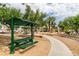 Community park with shaded picnic tables at 8808 Tom Noon Ave # 101, Las Vegas, NV 89178