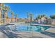 Community pool with surrounding patio at 8808 Tom Noon Ave # 101, Las Vegas, NV 89178