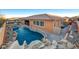 Luxury home with a large pool and backyard oasis at 8970 Rancho Durango Ct, Las Vegas, NV 89148