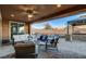 Outdoor patio with comfortable seating and pool access at 8970 Rancho Durango Ct, Las Vegas, NV 89148