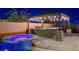 Hot tub at night with outdoor lighting at 8970 Rancho Durango Ct, Las Vegas, NV 89148