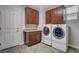 Convenient laundry room with washer, dryer, and ample storage at 8970 Rancho Durango Ct, Las Vegas, NV 89148