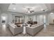 Bright and airy living room with hardwood floors and modern decor at 8970 Rancho Durango Ct, Las Vegas, NV 89148