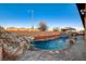 Stunning pool with waterfall and spa features at 8970 Rancho Durango Ct, Las Vegas, NV 89148