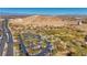 Aerial view of park with parking lot and mountain views at 8971 Dallas Ridge Ave, Las Vegas, NV 89178