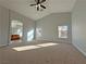 Main bedroom with vaulted ceiling, carpet, and en-suite bathroom at 8971 Dallas Ridge Ave, Las Vegas, NV 89178