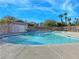 Community pool with surrounding patio at 8971 Dallas Ridge Ave, Las Vegas, NV 89178