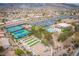 Community tennis courts, pool, bocce ball, and residential homes at 9520 Sundial Dr, Las Vegas, NV 89134