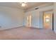 Large bedroom with an ensuite bathroom and access to a hallway at 9520 Sundial Dr, Las Vegas, NV 89134