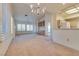 Elegant dining room showcasing a chandelier and an open floor plan at 9520 Sundial Dr, Las Vegas, NV 89134