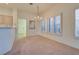 Charming dining room with a chandelier and large windows at 9520 Sundial Dr, Las Vegas, NV 89134