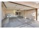 Two-car garage with washer, dryer, and extra storage at 9520 Sundial Dr, Las Vegas, NV 89134