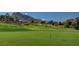 Green of golf course with mountain view at 9520 Sundial Dr, Las Vegas, NV 89134