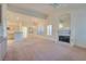 Bright living room features a fireplace and an open floor plan at 9520 Sundial Dr, Las Vegas, NV 89134