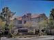 Tan two-story building with Spanish-style architecture at , Las Vegas, NV 89118