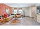 Bright and airy living room with L-shaped sofa and large windows at , North Las Vegas, NV 89084