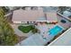 Aerial view of house, pool, and landscaped backyard at 10032 Fox Springs Dr, Las Vegas, NV 89117