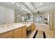 Large Primary bathroom with double vanity, soaking tub, and walk-in shower at 10032 Fox Springs Dr, Las Vegas, NV 89117