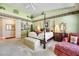 Spacious Primary bedroom with a king-size bed and a sitting area at 10032 Fox Springs Dr, Las Vegas, NV 89117