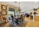 Cozy dining area with a view into the living room and backyard at 10032 Fox Springs Dr, Las Vegas, NV 89117