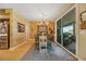Bright dining room with sliding glass doors leading to the backyard at 10032 Fox Springs Dr, Las Vegas, NV 89117