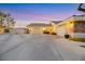 House exterior showcasing front yard and landscaping at 10032 Fox Springs Dr, Las Vegas, NV 89117