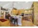 Open kitchen with light wood cabinets and breakfast bar at 10032 Fox Springs Dr, Las Vegas, NV 89117