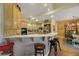 Spacious kitchen with island, ample cabinetry, and breakfast nook at 10032 Fox Springs Dr, Las Vegas, NV 89117