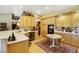 Bright kitchen featuring upgraded appliances and an eat-in area at 10032 Fox Springs Dr, Las Vegas, NV 89117