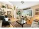 Bright and spacious living room with hardwood floors and large windows at 10032 Fox Springs Dr, Las Vegas, NV 89117