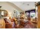 Cozy living room with comfortable seating, large windows, and decorative accents at 10032 Fox Springs Dr, Las Vegas, NV 89117