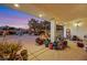 Covered patio showcasing plants and pool view at 10032 Fox Springs Dr, Las Vegas, NV 89117