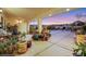 Covered patio with numerous plants and seating at 10032 Fox Springs Dr, Las Vegas, NV 89117