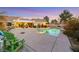 Serene backyard retreat complete with a sparkling pool and inviting patio at 10032 Fox Springs Dr, Las Vegas, NV 89117