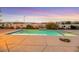 Relaxing pool area with spacious patio, offering a tranquil escape in the backyard at 10032 Fox Springs Dr, Las Vegas, NV 89117