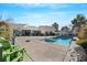 Inviting pool and spa with patio seating at 10032 Fox Springs Dr, Las Vegas, NV 89117