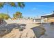 Large backyard with covered patio and gravel at 1206 Douglas Dr, Las Vegas, NV 89102