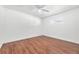 Simple bedroom with hardwood floors and ceiling fan at 1206 Douglas Dr, Las Vegas, NV 89102