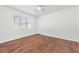 Bright bedroom with hardwood floors and ceiling fan at 1206 Douglas Dr, Las Vegas, NV 89102