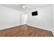 Spacious bedroom featuring hardwood floors and a TV mount at 1206 Douglas Dr, Las Vegas, NV 89102