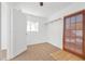 Bright bedroom with tile floors and backyard access at 1206 Douglas Dr, Las Vegas, NV 89102