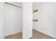 Spacious closet with wood shelving and tile floor at 1206 Douglas Dr, Las Vegas, NV 89102